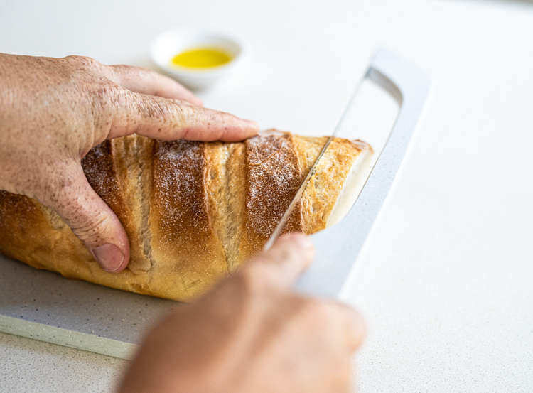 Reclaimed solid surface bread saw and board combo