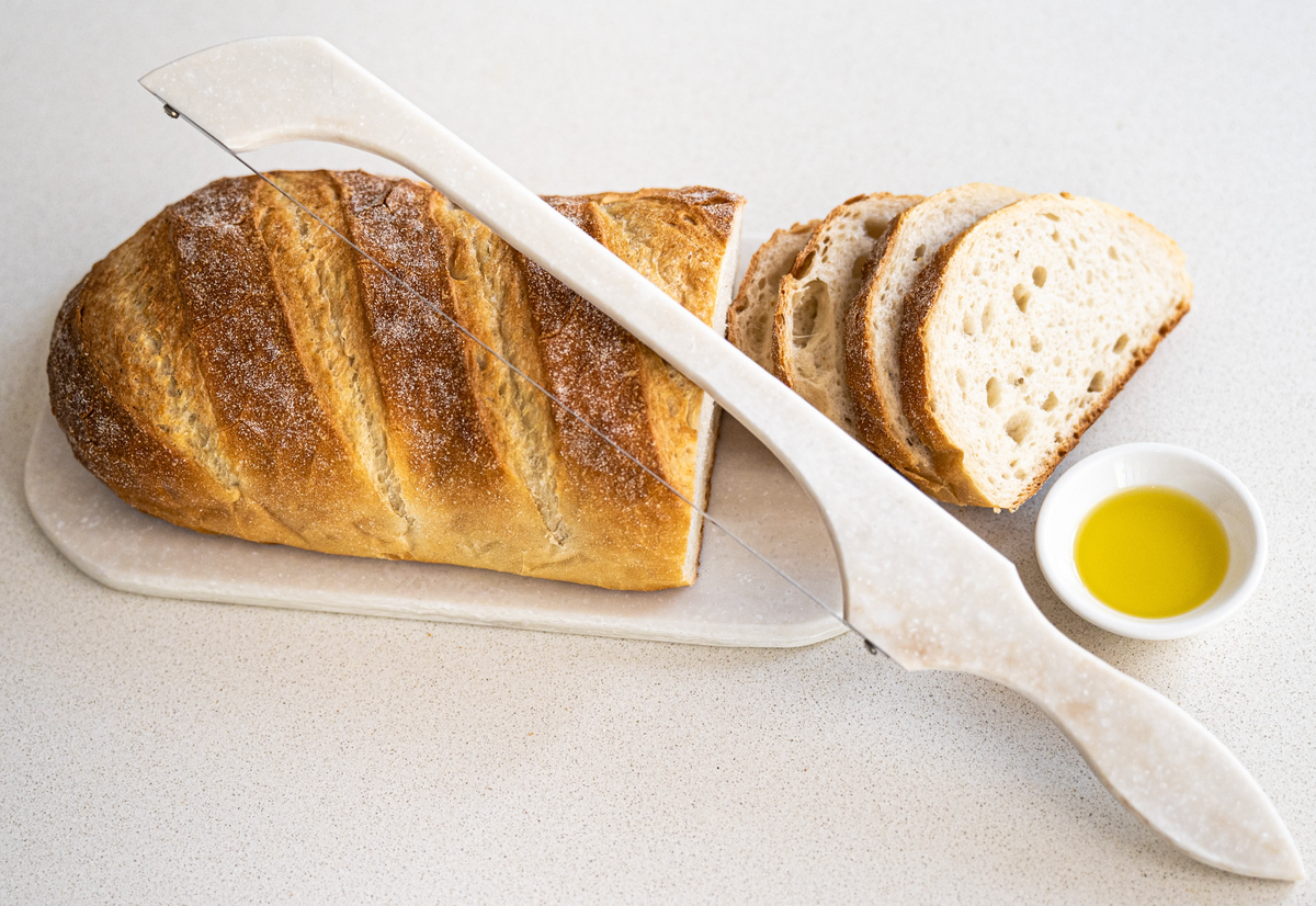 Reclaimed solid surface bread saw