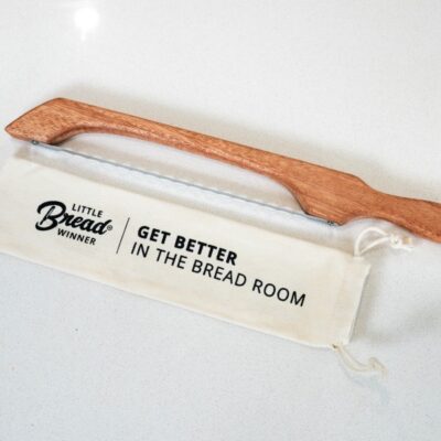 Bread Saw with Wooden Handle and Little Bread Winner pouch